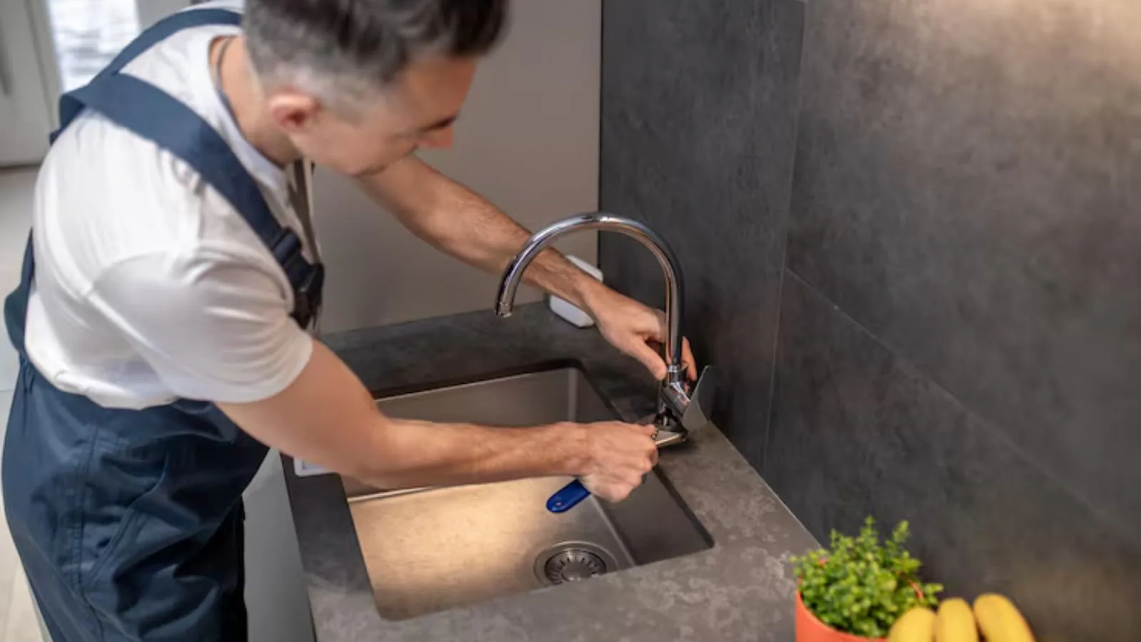 Faucet and sink repair in progress in an Upland, CA kitchen